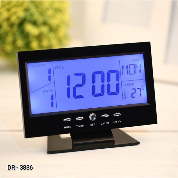 Multifunctional Digital Clock: LCD Display, Alarm, Calendar, and Temperature Monitor